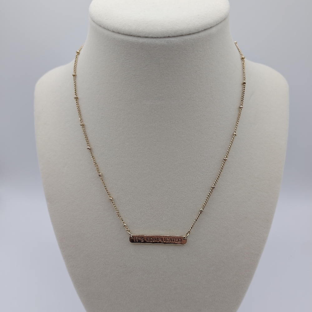 Liz Claiborne Gold Tone Pendant "It's Complicated" Adjustable Necklace